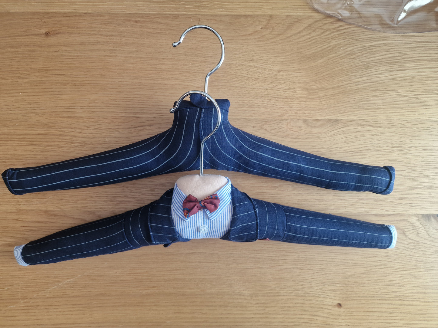 Set of 2 Men's Novelty Padded Hangers | Pinstripe Suit Design in navy blue striped fabric with white shirt, red bow tie and handkerchief detail in Homeware