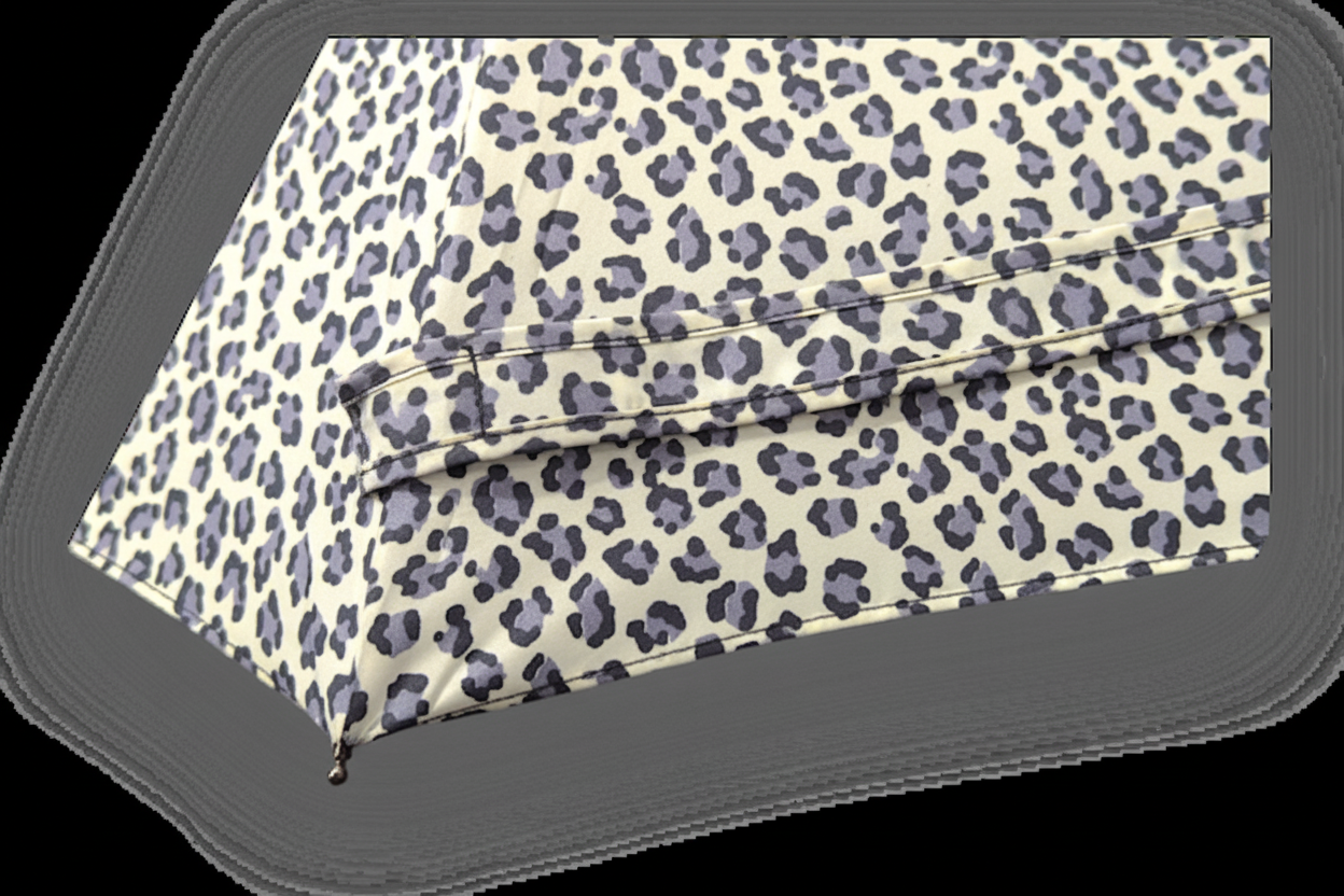 Mini Compact Umbrella - 4 Prints - L24cm Closed showing a folded pale leopard print canopy with black and grey spots and stitched panels for Fashion