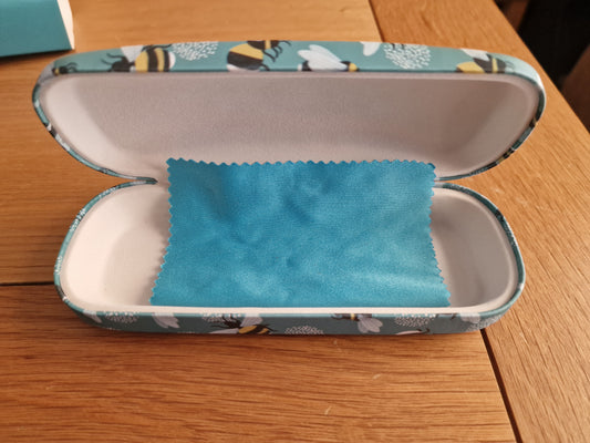 Garden Bee Design Glasses Case open hard shell with blue bee print and soft teal microfibre lining