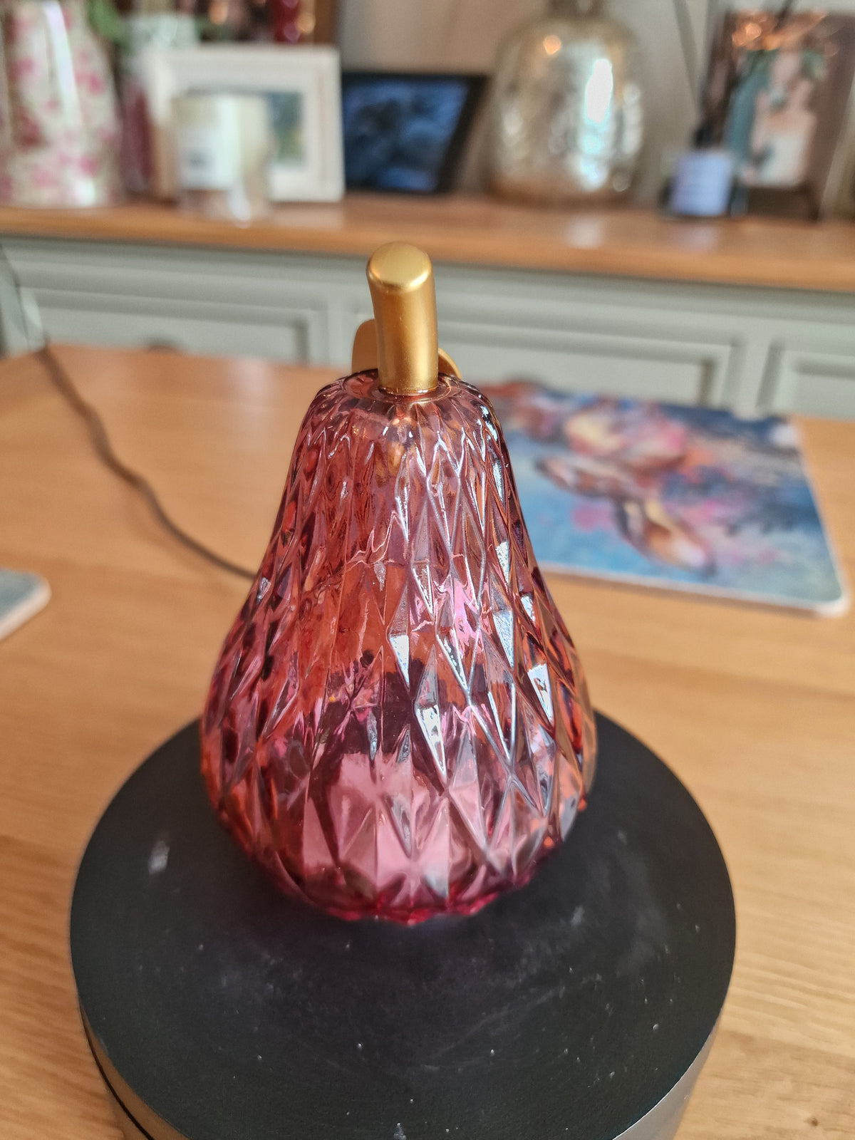 Red Glass Pear LED Light with Gold Stem & Leaf in faceted translucent red glass