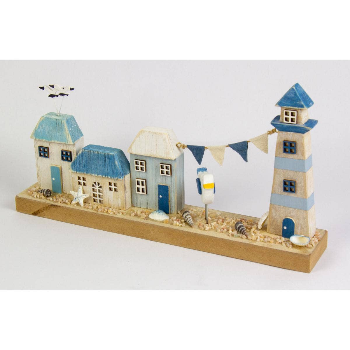 Harbourside Scene with Lighthouse and Cottages